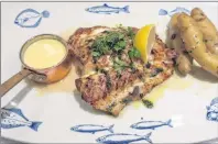  ?? SANDRA NOWLAN PHOTO ?? Wonderful fish — fresh grouper in Sel de Mer Restaurant.