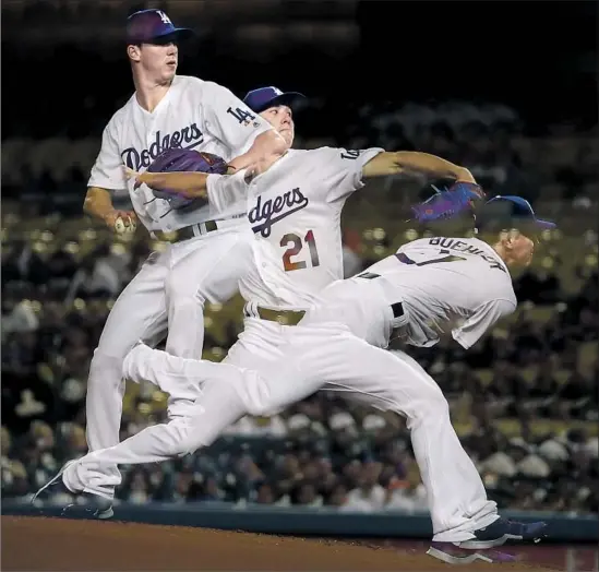  ?? Robert Gauthier Los Angeles Times ?? WALKER BUEHLER made his first start April 23 at Dodger Stadium and showed dominant stuff in five scoreless innings. He went 8-5 with a 2.62 ERA.