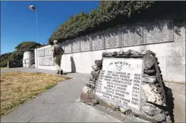  ?? Myung J. Chun Los Angeles Times ?? A MARBLE SLAB inscribed with the names of those lost at sea was built in the 1970s at the site of the lighthouse, with more names added throughout the years.