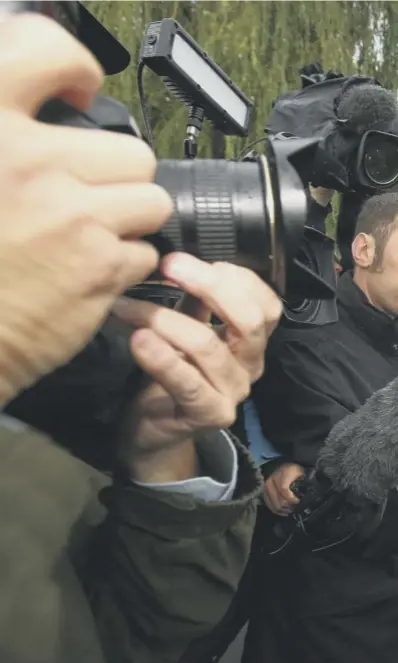  ??  ?? 0 Sam Allardyce talks to the media outside his Bolton home yesterday. Having relinquish­ed his duties