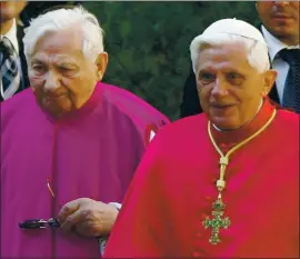  ?? AP FILE PHOTO ?? Pope Benedict XVI, right, walks with his brother, priest Georg Ratzinger, in Regensburg, southern Germany, in 2006.