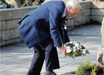 ??  ?? Poignant A wreath is laid at the Service of Remembranc­e at Callander in 2014