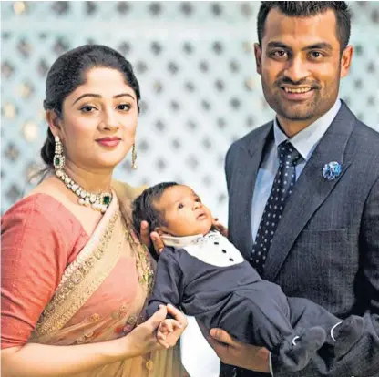  ??  ?? Bangladesh­i cricketer Tamim Iqbal, pictured with his wife Ayesha Siddiqa and son Mohammed Arham Iqbal, denied that they were victims of a hate crime