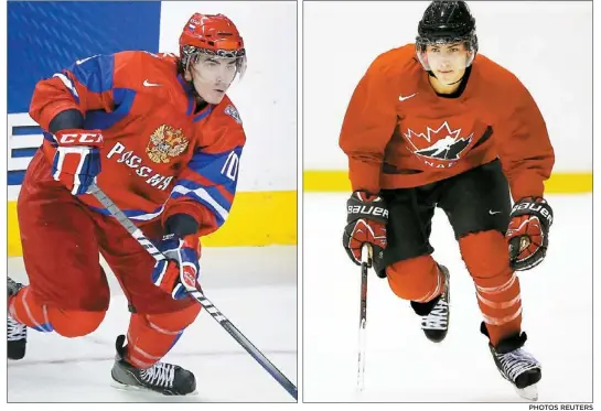  ?? PHOTOS REUTERS ?? √ Les deux plus récents choix de première ronde des Oilers d’Edmonton, Nail Yakupov et Ryan Nugent-Hopkins, joueront l’un contre
l’autre aujourd’hui dans un duel très attendu entre le Canada et la Russie.