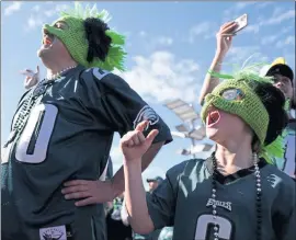  ?? THE ASSOCIATED PRESS ?? Philadelph­ia Eagles fans cheer before Super Bowl LVII.