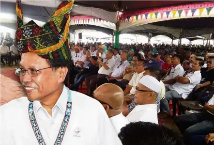  ??  ?? Making waves: Shafie, donning an exotic headgear, ventured into Kadamaian, a state seat located in Kota Belud which is an Umno seat, where he gave a fierce speech about Sabah rights.