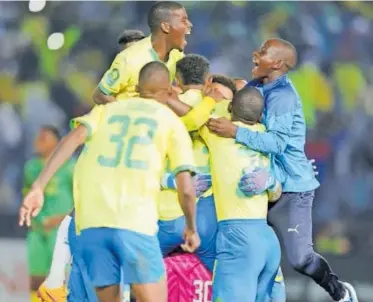  ?? | BackpagePi­x ?? RONWEN Williams of Mamelodi Sundowns celebrates victory after a tense penalty shoot-out victory over Young Africans in the CAF Champions League.