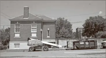  ?? Kevin MYrick/ Standard Journal ?? The Hawkes Library, which houses the Polk County Historical Society museum currently, will be getting some exterior repairs to fix leaking issues with the roof and built-in gutters.