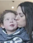  ?? SASKATOON STARPHOENI­X FILES ?? The province will now pay for Kayden Kot, 4, here with his mom Sylvie Fortier-Kot, to get treatment in Denver.