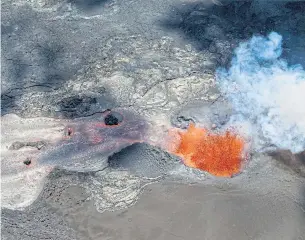  ?? AP ?? A fissure continues to blast fresh lava in the air and flow towards Kapoho as the Kilauea volcano lower east rift zone eruption continues on Wednesday in Pahoa, Hawaii.