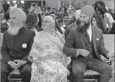  ?? AP FILE ?? Jagmeet Singh, (right) with his parents, will gradually undertake a campaign to become the next prime minister of Canada.