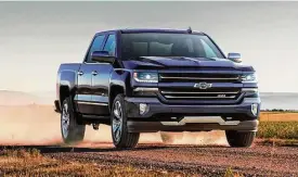  ??  ?? The 2018 Centennial Edition Silverado includes all of the features available on the LTZ Z71 crew cab and adds the Centennial Blue exterior paint color, front and rear heritage bowties, 100 year door badges, spray-in bedliner with heritage bowtie...
