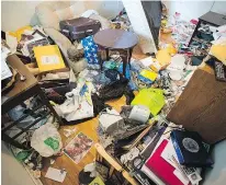  ?? — SIMON ANDREW ?? Garbage fills a room of Simon Andrew’s rental house in Kingston, Ont.