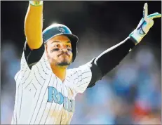  ?? Chris Humphreys ?? USA Today Nolan Arenado celebrates after hitting a walk-off three-run homer in the ninth inning of the Rockies’ 7-5 win over the Giants on Sunday at Coors Field. The blast capped the All-star third baseman’s first cycle.