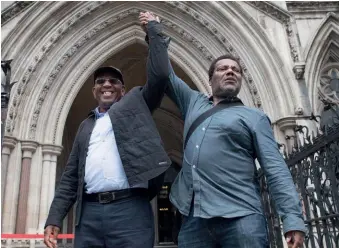  ?? ?? Free at last: Paul Green (left) and Cleveland Davidson celebrate after having their conviction­s overturned at the Court of Appeal