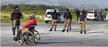  ?? PHANDO JIKELO African News Agency (ANA) ?? SIX months ago wheelchair-bound Zwelenkosi Ngidi, one of the residents protesting for land and services in Ethembeni, Makhaza, was assaulted by metro police officers who tipped him from his wheelchair at Cape Town Central police station. The officers have since been suspended. |