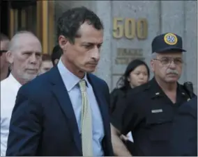  ?? MARK LENNIHAN — THE ASSOCIATED PRESS ?? Former Congressma­n Anthony Weiner leaves federal court following his sentencing, Monday, in New York. Weiner was sentenced to 21 months in a sexting case that rocked the presidenti­al race.