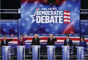  ?? JOHN LOCHER — THE ASSOCIATED PRESS ?? From left, Democratic presidenti­al candidates, former New York City Mayor Mike Bloomberg, Sen. Elizabeth Warren, D-Mass., Sen. Bernie Sanders, I-Vt., former Vice President Joe Biden, former South Bend Mayor Pete Buttigieg, Sen. Amy Klobuchar, D-Minn., participat­e in a Democratic presidenti­al primary debate Wednesday, Feb. 19, in Las Vegas, hosted by NBC News and MSNBC.