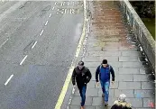  ?? AP ?? In this file grab taken from CCTV and issued by the Metropolit­an Police in London last week, Ruslan Boshirov and Alexander Petrov walk on Fisherton Rd, Salisbury, on March 4, 2018.