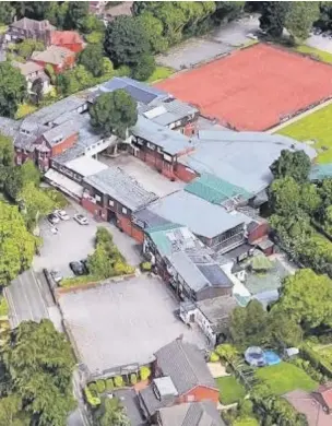  ??  ?? ●●Aerial view of the former Hulme Hall School, which closed in 2017