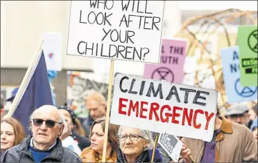  ?? ?? Climate change campaigner­s during a protest in Canterbury last year
