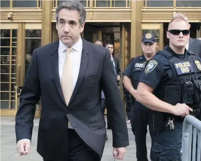  ?? MARY ALTAFFER / THE ASSOCIATED PRESS ?? Michael Cohen leaves U.S. federal court in New York Tuesday, when he pleaded guilty to campaign finance fraud charges stemming from hush-money payments to porn actress Stormy Daniels and Playboy model Karen Mcdougal.