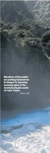  ?? Photo / File ?? Members of the public are putting themselves in danger by ignoring warning signs at the Aratiatia Rapids north of Lake Taupo¯.