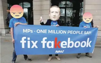  ??  ?? Protesters from the pressure group Avaaz demonstrat­e against Facebook outside Portcullis House in Westminste­r, London, on April 26. — Reuters file photo