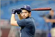  ?? AP-Chris O’Meara, File ?? FILE — In this Oct. 8, 2019 file photo Tampa Bay Rays catcher Travis d’Arnaud waits to take batting practice before Game 4 of a baseball American League Division Series against the Houston Astros in St. Petersburg, Fla. The Atlanta Braves have filled another hole by signing d’Arnaud to a $16 million, two-year contract. His signing with the Braves was announced Sunday.