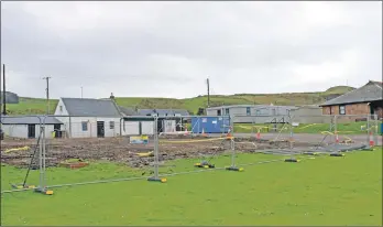  ?? 50_c11machgol­f02 ?? McFadyens Contractor­s have demolished the Machrihani­sh clubhouse. In the background, right, are portable changing facilities.