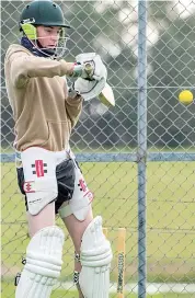  ??  ?? Jake Dean glances this shot away during his net session.