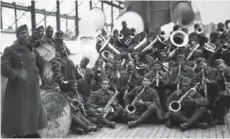  ?? — AFP photos ?? A picture taken in February 1919 shows US 369th Infantry Regiment Jazz orchestra aboard the SS Stockholm heading to the united States.