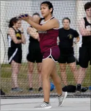  ?? Bud Sullins/Special to the Herald-Leader ?? Stephanie Suaste prepares to throw the discus at the Panther Relays.