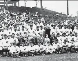  ?? LIBRARY OF CONGRESS, ?? Cubs President William Veeck (second row, center, in suit and bow tie) sits with his team at Wrigley Field in an undated photo taken in the late 1920s.
