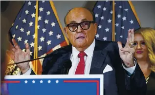  ?? JACQUELYN MARTIN — THE ASSOCIATED PRESS ?? Rudy Giuliani, a lawyer for President Donald Trump, is not listed as being paid by Trump’s campaign.