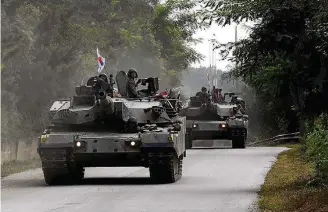  ?? AHN YOUNG-JOON/AP ?? Alta tensão. Tanques sul-coreanos em exercício militar na fronteira com a Coreia do Norte