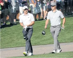  ?? REUTERS ?? Rory McIlroy, left, and Justin Thomas during a practice round at Augusta.