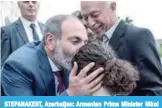  ??  ?? STEPANAKER­T, Azerbaijan: Armenian Prime Minister Nikol Pashinyan kisses a girl as he meets with locals in Stepanaker­t, the capital of Azerbaijan’s breakaway Nagorny Karabakh region. — AFP