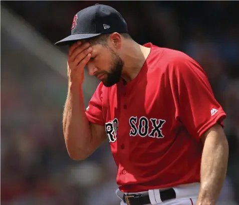  ?? NANCY LANE / BOSTON HERALD ?? OUCH: Nathan Eovaldi reacts after giving up a three-run homer in the first inning.