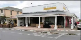  ??  ?? This Wynberg property, to be auctioned by Rawson Auctions Western Cape on January 24, comprises a lettable four-bedroomed house and three adjoining shops that are currently let.