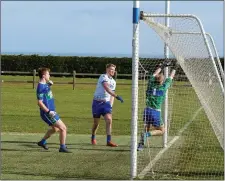  ??  ?? Tommy Kelly finishes to the back of the AGB net.