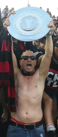  ?? STEVE RUSSELL/TORONTO STAR ?? Toronto FC shared the Supporters’ Shield with . . . well, supporters in the south end at BMO Field on Sunday.