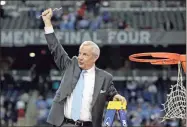  ?? AP-Paul Sancya, File ?? North Carolina head coach Roy Williams celebrates after his team’s 89-72 victory over Michigan State in the championsh­ip game at the men’s NCAA Final Four college basketball tournament in Detroit, in this 2009 file photo. North Carolina announced Thursday that Williams is retiring after a 33-year career that includes three national championsh­ips.