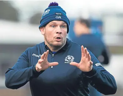  ?? SNS. ?? Top: Scotland players get their heads together during a break in training at the Oriam; Gordon Reid, above, has called on Gregor Townsend’s side to stay focused for the Calcutta Cup clash.