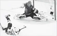  ?? ETHAN MILLER GETTY IMAGES ?? Devante Smith-Pelly scores the third-period goal that tied the game against the Vegas Golden Knights Thursday.