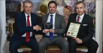  ??  ?? Winner of the Best Family Run Business Award sponsored by Garveys SuperValu, left, Kevin McCarthy (Garveys), Mark McElligott (McElligott EZ Living Furniture) and John Feerick (Managing Director The Kerryman).