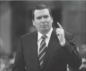  ?? REUTERS FILE PHOTO ?? Industry Minister Christian Paradis’ office says unpaid fees did not occur on his watch.