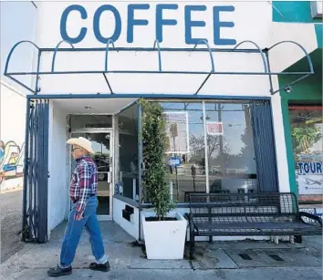  ?? Photograph­s by Gary Coronado Los Angeles Times ?? WEIRD WAVE Coffee in Boyle Heights has been criticized by protesters who see it as a symbol of gentrifica­tion and displaceme­nt. In less than a week, the shop on Cesar Chavez Avenue has been vandalized twice.