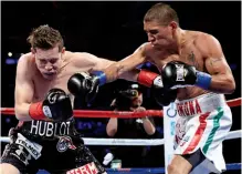  ??  ?? GRUELLING: Carmona [right] nails Cuadras