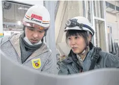  ??  ?? Yuho Nakamura, 25, a structural work supervisor with Shimizu Corporatio­n, oversees up to 30 workers at a building site in downtown Tokyo.